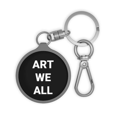 Artistic keyring tag with black round design and white "ART WE ALL" text, metal keyring and clip accessory for art lovers and creatives.