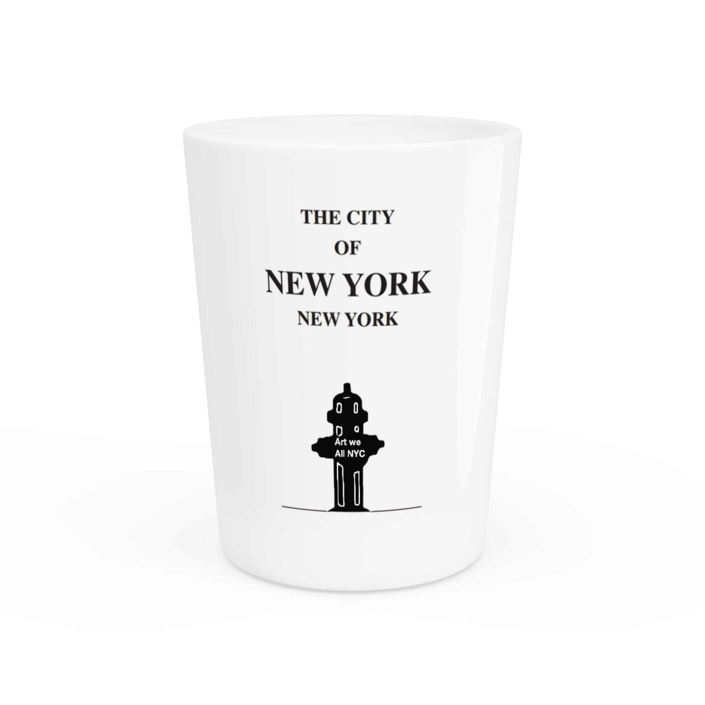 white ceramic New York shot glass with black NYC design and text souvenir barware
