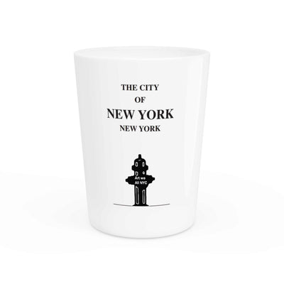 white ceramic New York shot glass with black NYC design and text souvenir barware