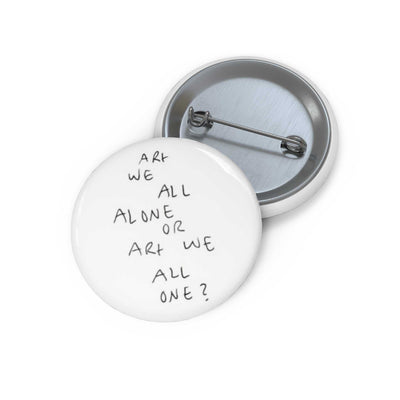 Art Pin Buttons with "Art We All Alone or Art We All One?" design and steel safety pin backing