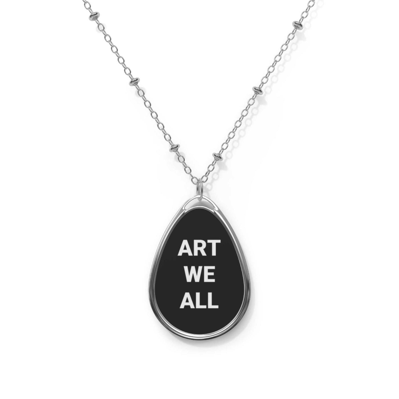 Artistic Oval Necklace with black ellipse pendant and "ART WE ALL" text, silver chain statement jewelry for everyday wear and gifts